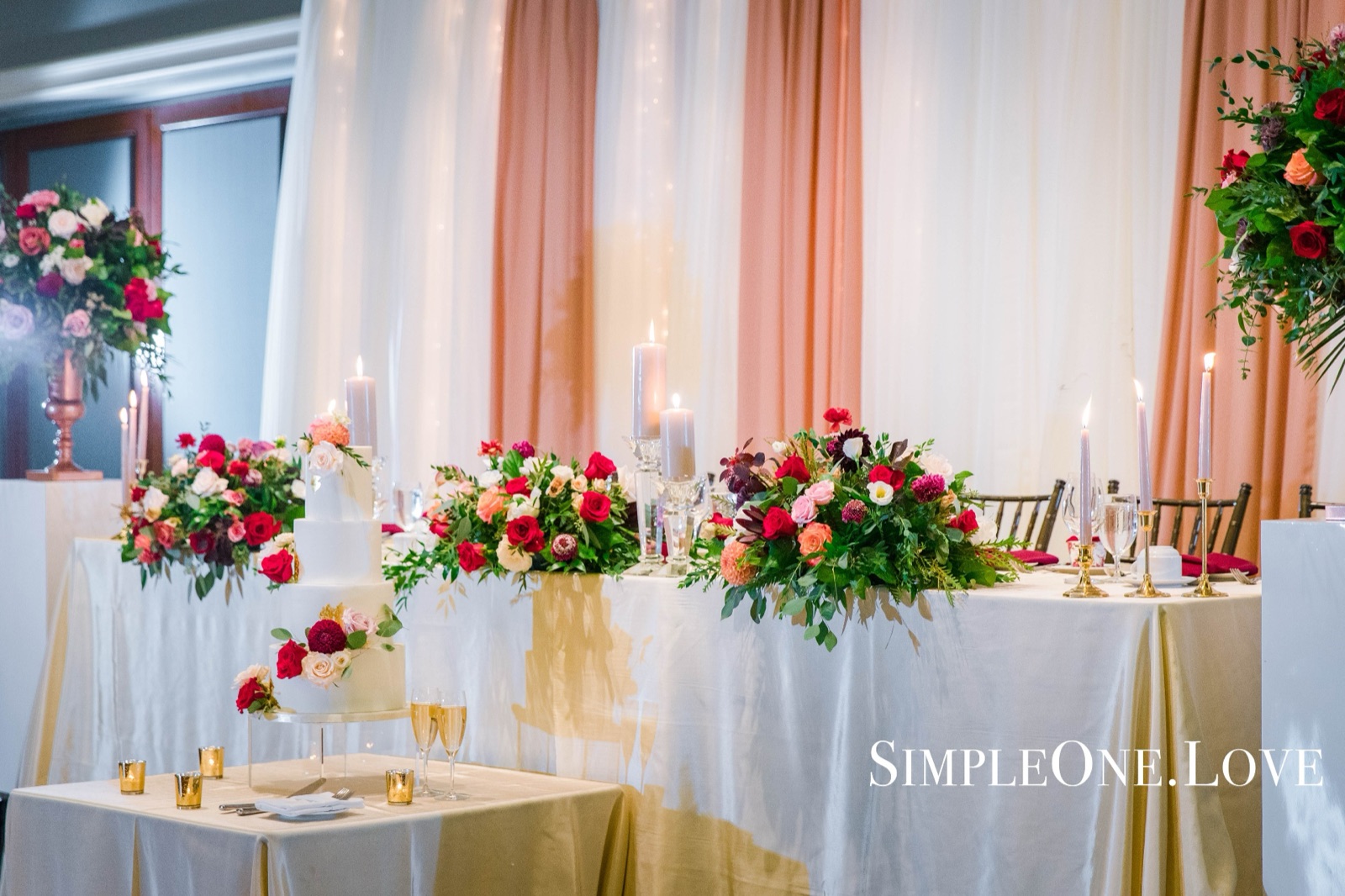 Flowers across the head table at the same venue.